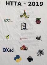 White t-shirt printed with "HTTA - 2019" and various tech logos