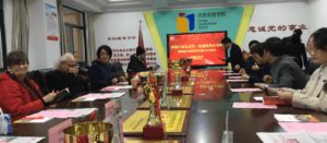 Delegation meeting with school administrators around a conference table