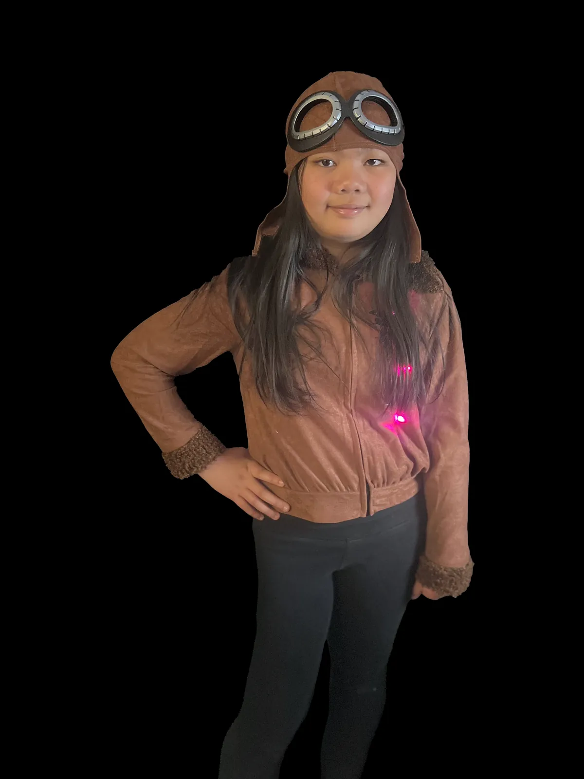 Student as Bessie Coleman in a brown aviator jacket and leather flying cap with goggles, a pink LED glowing at the waist