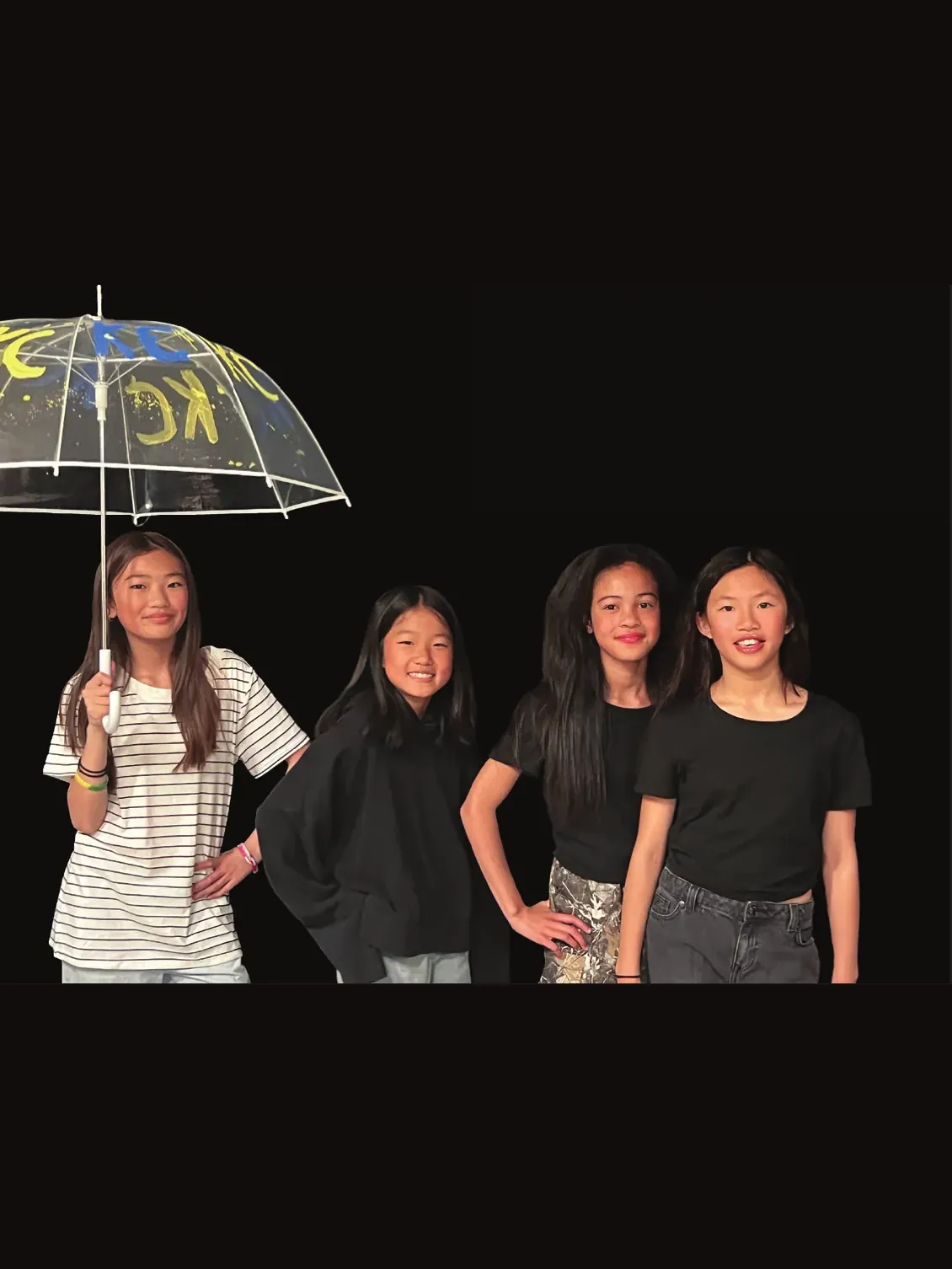 Four students for Zendaya, one holding a clear umbrella with a lit message