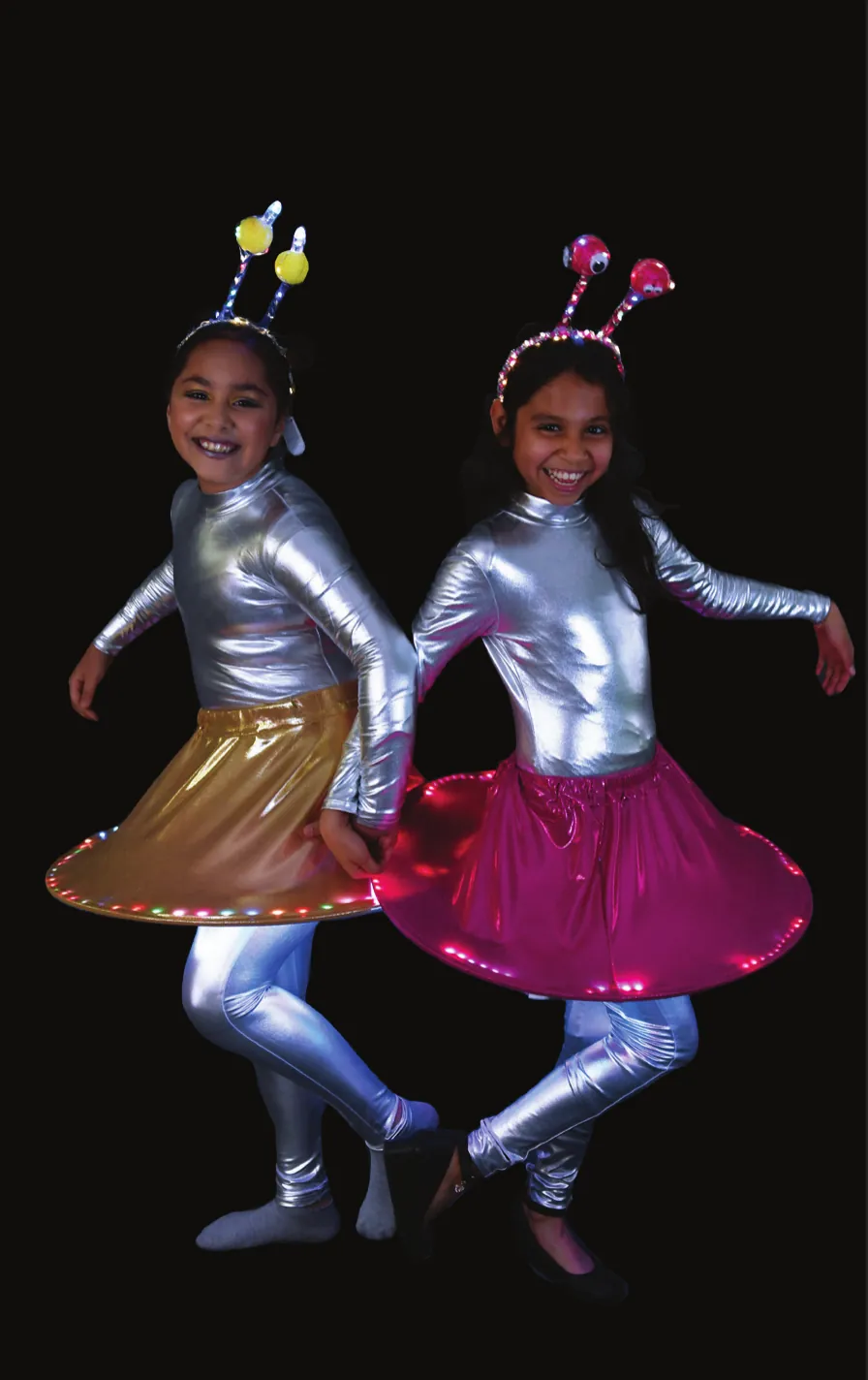 Alien Twins: two students in silver bodysuits, antenna headbands and flared pink and gold spaceship skirts