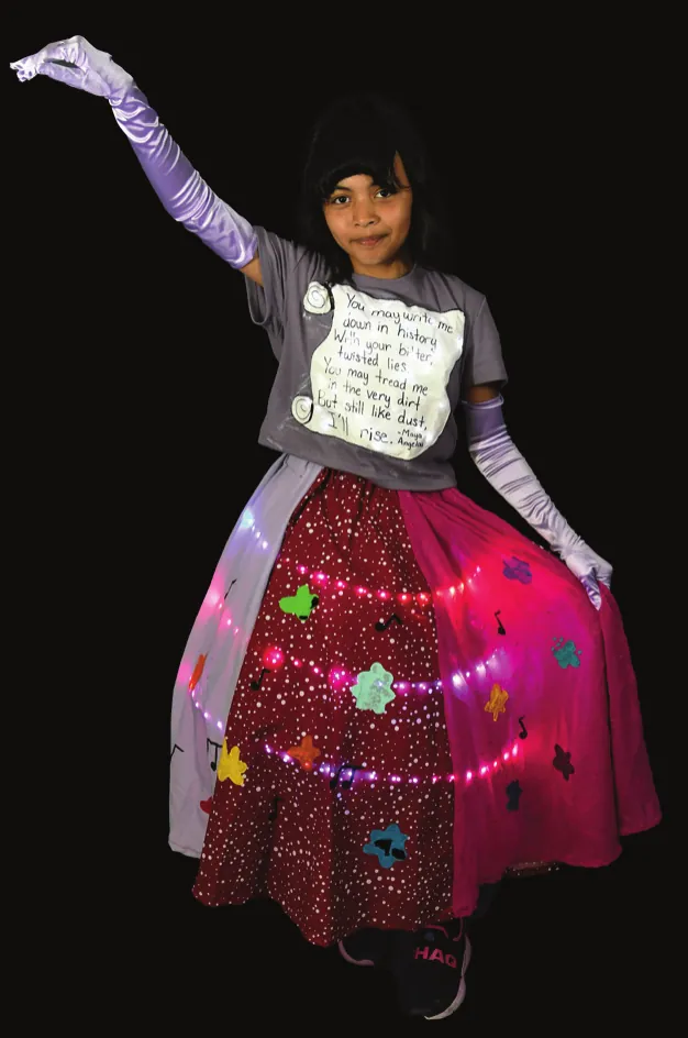 Culture Connects: student with one arm raised in a red skirt dotted with lights and a handwritten message on the top