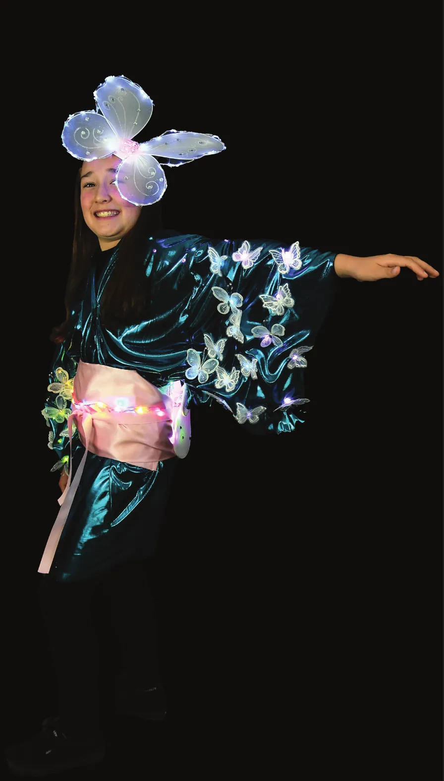 Madame Butterfly: student in a teal kimono-style top dotted with white butterflies and a butterfly headpiece