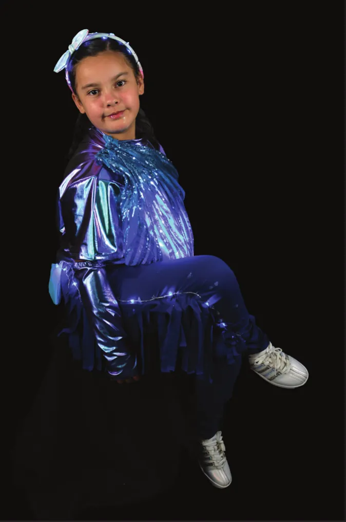 Poseidon: Water: student in a shimmering blue outfit with lights glowing like water
